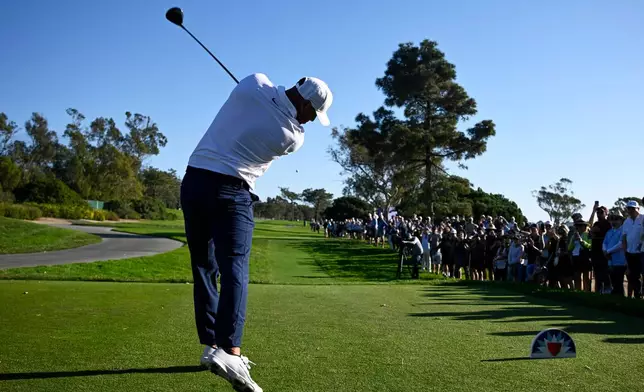 Brooks Koepka tees off on the ninth hole while playing the North Course at Torrey Pines during the second round of the Farmers Insurance Open golf tournament Friday, Jan. 30, 2026, in San Diego. (AP Photo/Denis Poroy)