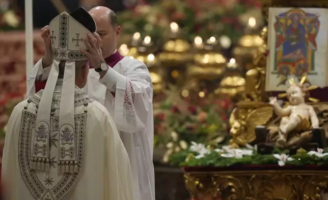 Pope Leo XIV presides over the first Vespers and the 'Te Deum' in St. Peter's Basilica at the Vatican, Wednesday, Dec. 31, 2025. (AP Photo/Andrew Medichini)