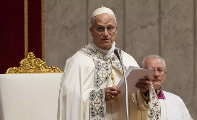 Pope Leo XIV arrives to preside over the first Vespers and the 'Te Deum' in St. Peter's Basilica at the Vatican, Wednesday, Dec. 31, 2025. (AP Photo/Andrew Medichini)