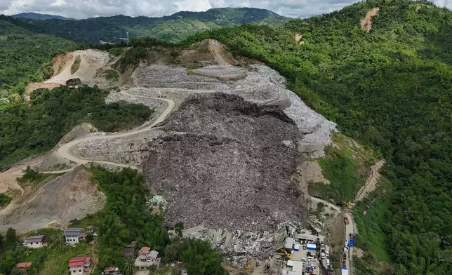 A huge mound of garbage that collapsed Thursday afternoon at a waste segregation facility in Binaliw, Cebu city, central Philippines is seen on Saturday Jan. 10, 2026. (AP Photo/Jacqueline Hernandez)