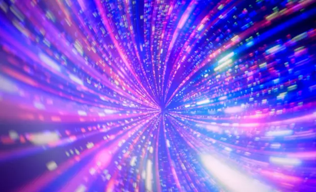 Color and light flood the OMNIMAX theater screen before a viewing of the "Ohio: Wild at Heart" film that features the state's top-rated park system to highlight wildlife conservation efforts and the restorative power of outdoor recreation at the Robert D. Lindner Family OMNIMAX Theater at the Cincinnati Union Terminal, Tuesday, Dec. 30, 2025, in Cincinnati. (AP Photo/Carolyn Kaster)