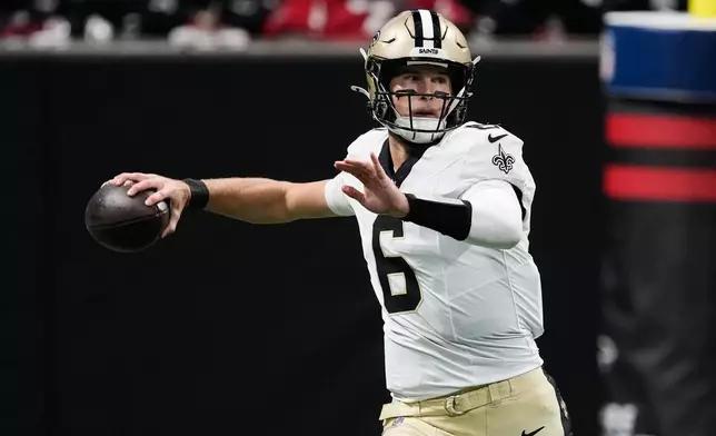 New Orleans Saints quarterback Tyler Shough (6) drops back to pass against the Atlanta Falcons in the first half of an NFL football game, Sunday, Jan. 4, 2026, in Atlanta. (AP Photo/Brynn Anderson)