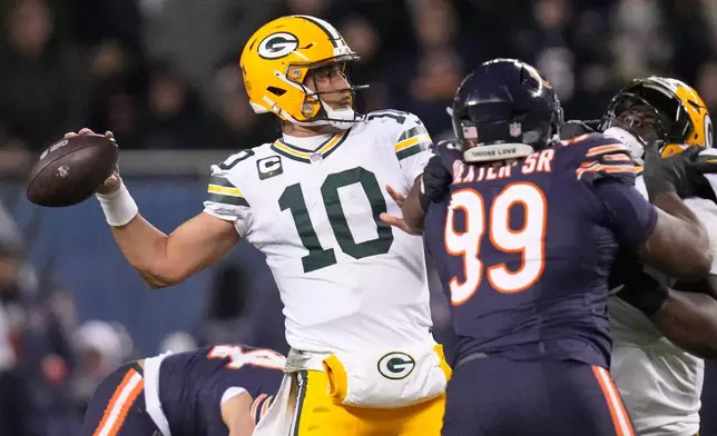 Green Bay Packers' Jordan Love throws during the first half of an NFL wild-card playoff football game against the Chicago Bears Saturday, Jan. 10, 2026, in Chicago. (AP Photo/Erin Hooley)