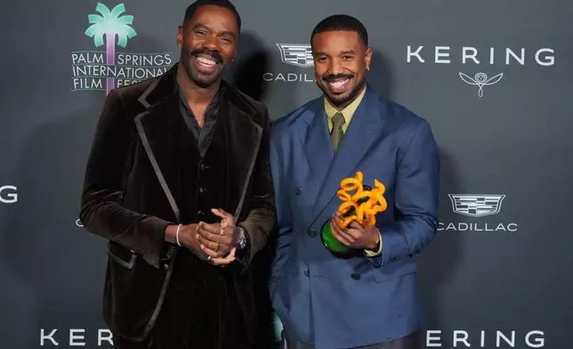 Colman Domingo, left, and Michael B. Jordan, with the icon award for his performance in "Sinners," pose in the press room during the 37th Palm Springs International Film Festival Film Awards on Saturday, Jan. 3, 2026 at Palm Springs Convention Center in Palm Springs, Calif. (Photo by Jordan Strauss/Invision/AP)