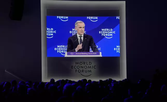Canada's Prime Minister Mark Carney speaks during the Annual Meeting of the World Economic Forum in Davos, Switzerland, Tuesday, Jan. 20, 2026. (AP Photo/Markus Schreiber)
