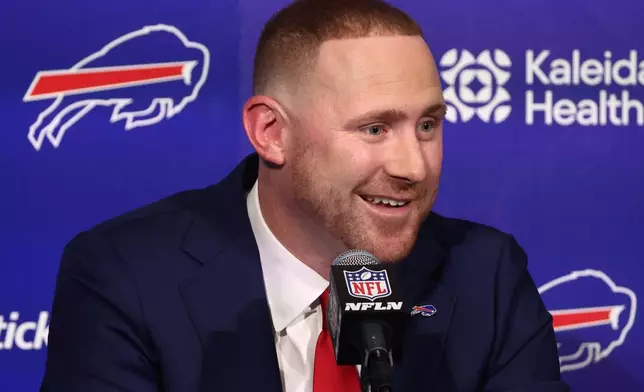 Joe Brady meets with reporters after being introduced as the new head coach of the Buffalo Bills in Orchard Park, N.Y., Thursday, Jan. 29, 2026. (AP Photo/Jeffrey T. Barnes)