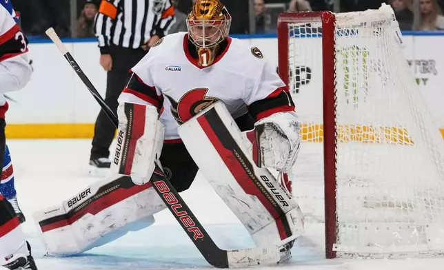 Ottawa Senators goaltender Leevi Meriläinen (1) protects the net during the second period of an NHL hockey game against the New York Rangers Wednesday, Jan. 14, 2026, in New York. (AP Photo/Frank Franklin II)