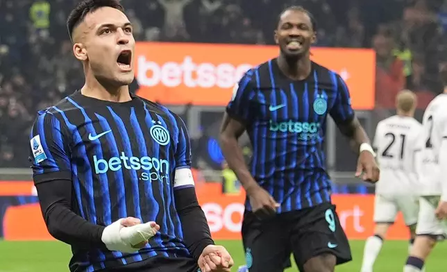 Inter Milan's Lautaro Martinez celebrates after scoring his side's second goal during the Italian Serie A soccer match between Inter and Bologna in Milan, Italy, Sunday, Jan. 4, 2026. (Spada/LaPresse via AP)