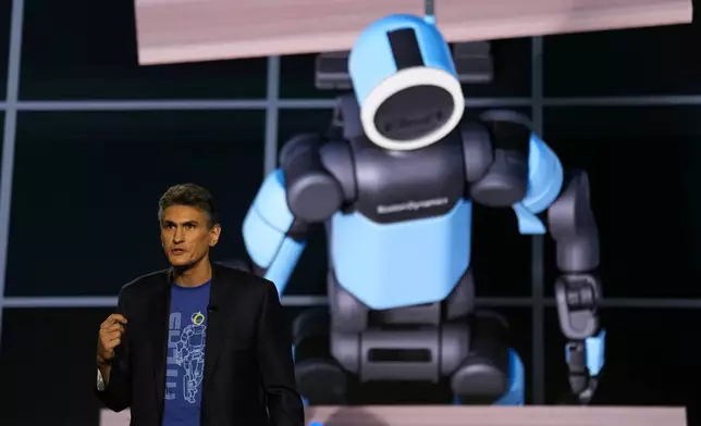 Vice president and general manager of Atlas at Boston Dynamics, Zachary Jackowski, talks during a Hyundai and Boston Dynamics news conference ahead of the CES tech show, Monday, Jan. 5, 2026, in Las Vegas. (AP Photo/Abbie Parr)