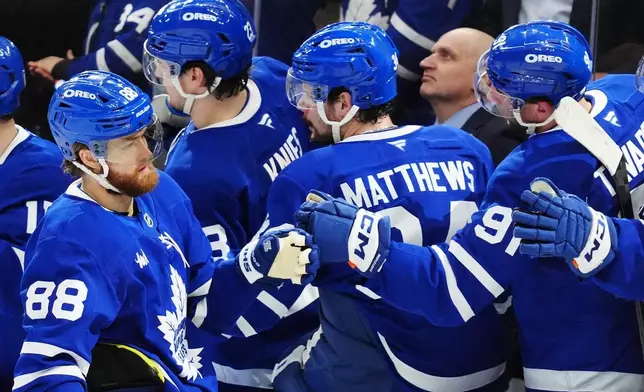 Toronto Maple Leafs' William Nylander (88) celebrates after his goal against the Vancouver Canucks during first-period NHL hockey game action in Toronto, Saturday, Jan. 10, 2026. (Frank Gunn/The Canadian Press via AP)