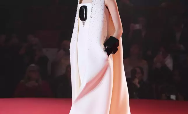 FILE - A model wears a creation as part of the Stephane Rolland Spring/Summer 2026 Haute Couture collection presented in Paris, Tuesday, Jan. 27, 2026. (AP Photo/Aurelien Morissard, File)