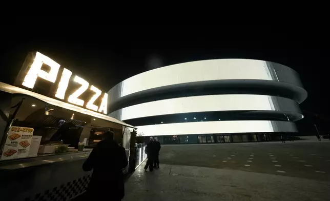 An outside view of the Santa Giulia Ice Hockey Arena, where Ice Hockey discipline of the Milan Cortina 2026 Winter Olympics will take place, in Milan, Italy, Friday, Jan. 9, 2026. (AP Photo/Luca Bruno)