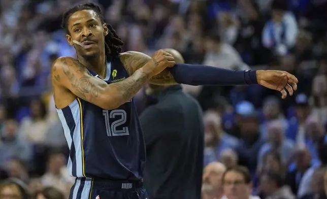 Memphis Grizzlies guard Ja Morant during the first half of an NBA basketball game against the Orlando Magic Sunday, Jan. 18, 2026, in London. (AP Photo/Kin Cheung)