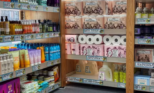 Toilet paper sits on shelves at a Trader Joe's in Alexandria, Va., Jan. 4, 2026. (AP Photo/Michael Phillis)