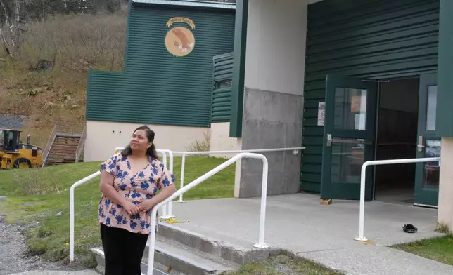 FILE - Tupe Smith poses for a photo outside the school in Whittier, Alaska, May 13, 2025. (AP Photo/Mark Thiessen, File)