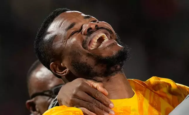 Nigeria's goalkeeper Francis Uzoho celebrates after winning on penalties during the Africa Cup of Nations third place game between Egypt and Nigeria in Casablanca, Morocco, Saturday, Jan. 17, 2026. (AP Photo/Themba Hadebe)