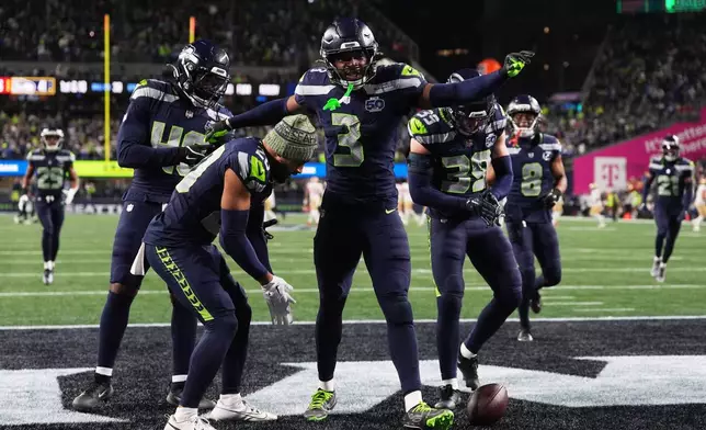 Seattle Seahawks safety Nick Emmanwori (3) celebrates after recovering ball fumbled by San Francisco 49ers quarterback Brock Purdy, not pictured, during the second half of an NFL football divisional playoff game Saturday, Jan. 17, 2026, in Seattle. (AP Photo/Lindsey Wasson)