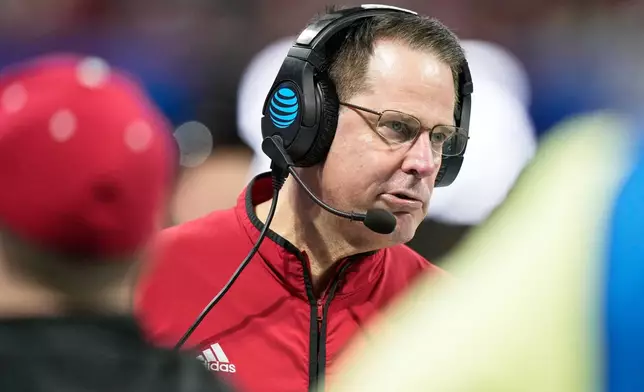 Indiana head coach Curt Cignetti talks on the sideline during the second half of the Peach Bowl NCAA college football playoff semifinal against Oregon, Friday, Jan. 9, 2026, in Atlanta. (AP Photo/Brynn Anderson)
