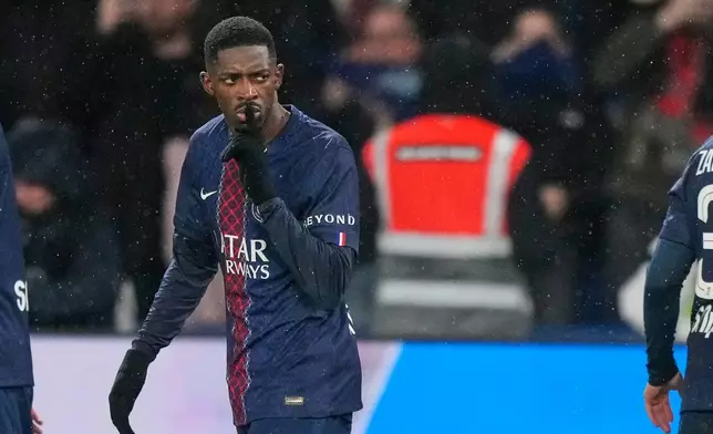 PSG's Ousmane Dembele celebrates after scoring his side's second goal during the French League One soccer match between Paris Saint-Germain and Lille in Paris, France, Friday, Jan. 16, 2026. (AP Photo/Michel Euler)