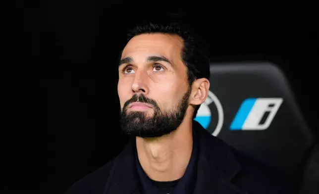 Real Madrid's head coach Alvaro Arbeloa looks skywards before the start of the Spanish La Liga soccer match between Real Madrid and Levante in Madrid, Spain, Saturday, Jan. 17, 2026. (AP Photo/Jose Breton)