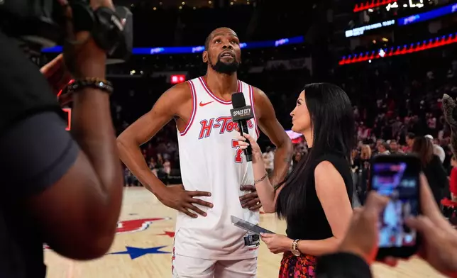 Houston Rockets forward Kevin Durant (7) is interviewed after surpassing Dirk Nowitzki to become the NBA's sixth all-time leading scorer in an NBA basketball game against the New Orleans Pelicans in Houston, Sunday, Jan. 18, 2026. (AP Photo/Ashley Landis)