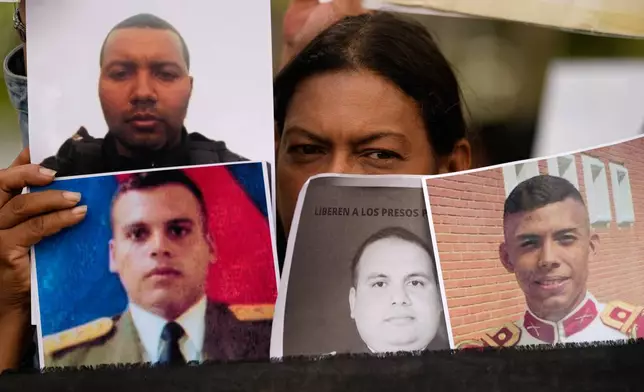 Relatives and human rights activists rally outside the Attorney General's Office in Caracas, Venezuela, Tuesday, Jan. 20, 2026, calling for the release of people they consider to be detained for political reasons. (AP Photo/Ariana Cubillos)