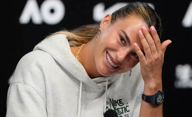 Aryna Sabalenka of Belarus reacts during a press conference ahead of the Australian Open tennis championship in Melbourne, Australia, Friday, Jan. 16, 2026. (AP Photo/Aaron Favila)