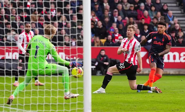 Nottingham Forest's Igor Jesus scores their side's first goal of the game during their English Premier League soccer match against Brentford in London, Sunday, Jan. 25, 2026. (Bradley Collyer/PA via AP)
