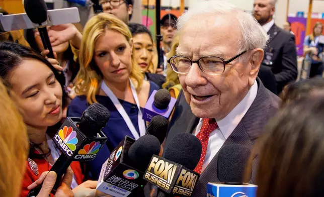 FILE - Warren Buffett, Chairman and CEO of Berkshire Hathaway, speaks to reporters before presiding over the annual shareholders meeting in Omaha, Neb., May 4, 2019. (AP Photo/Nati Harnik, File)
