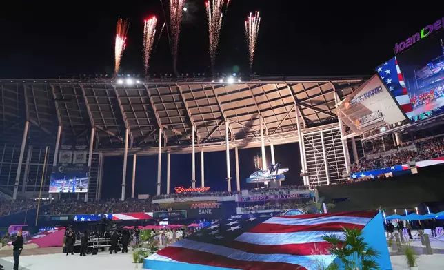 Fireworks explode over loanDepot Park before the NHL Winter Classic outdoor hockey game between the Florida Panthers and the New York Rangers, Friday, Jan. 2, 2026, in Miami. (AP Photo/Lynne Sladky)