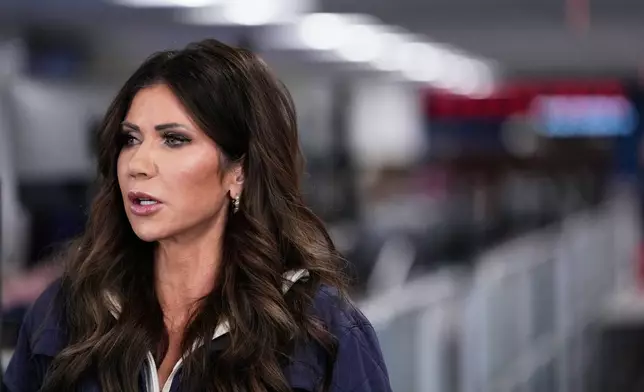 Homeland Security Secretary Kristi Noem speaks during a news conference at Federal Emergency Management Agency headquarters, Saturday, Jan. 24, 2026, in Washington. (AP Photo/Julia Demaree Nikhinson)