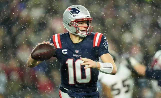 New England Patriots quarterback Drake Maye (10) passes against the Houston Texans during the second half of an NFL divisional playoff football game, Sunday, Jan. 18, 2026, in Foxborough, Mass. (AP Photo/Robert F. Bukaty)