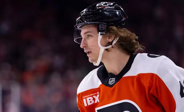 Philadelphia Flyers' Trevor Zegras looks on after scoring his second goal of the period during the first period of an NHL hockey game against the Anaheim Ducks, Tuesday, Jan. 6, 2026, in Philadelphia. (AP Photo/Chris Szagola)