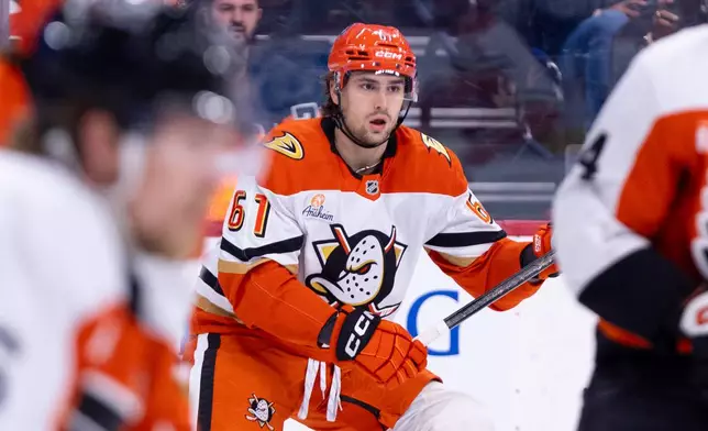 Anaheim Ducks' Cutter Gauthier looks for the puck during the first period of an NHL hockey game against the Philadelphia Flyers, Tuesday, Jan. 6, 2026, in Philadelphia. (AP Photo/Chris Szagola)