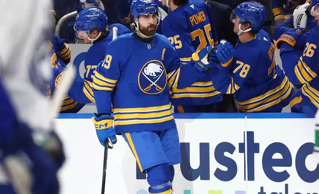 Buffalo Sabres right wing Alex Tuch (89) celebrates his goal during the second period of an NHL hockey game against the Vancouver Canucks Tuesday, Jan. 6, 2026, in Buffalo, N.Y. (AP Photo/Jeffrey T. Barnes)