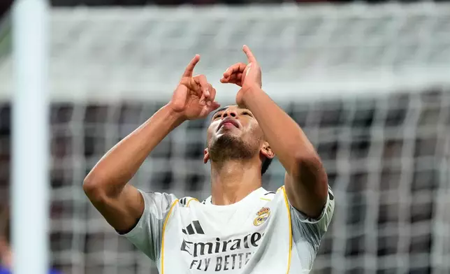 Real Madrid's Jude Bellingham celebrates his side's sixth goal during the Champions League opening phase soccer match between Real Madrid and Monaco in Madrid on Tuesday, Jan. 20, 2026. (AP Photo/Jose Breton)