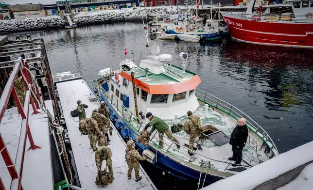 Danish soldiers disembark at the harbor in Nuuk, Greenland, on Sunday, Jan. 18, 2026. (Mads Claus Rasmussen/Ritzau Scanpix via AP)