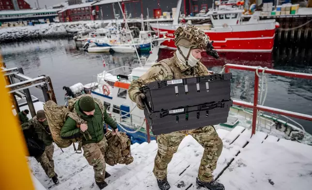 Danish soldiers disembark at the harbor in Nuuk, Greenland, on Sunday, Jan. 18, 2026. (Mads Claus Rasmussen/Ritzau Scanpix via AP)