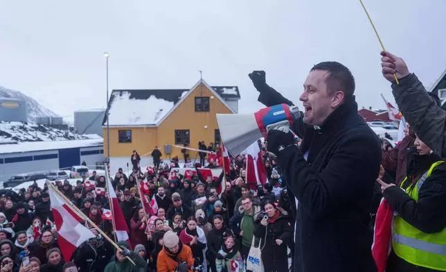 Greenlandic Prime Minister Jens-Frederik Nielsen speaks during a protest against Trump's policy towards Greenland in front of the US consulate in Nuuk, Greenland, Saturday, Jan. 17, 2026. (AP Photo/Evgeniy Maloletka)