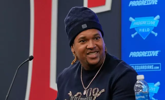 Cleveland Guardians third baseman Jose Ramirez smiles during a news conference to announce his contract extension in Cleveland, Thursday, Jan. 29, 2026. (AP Photo/Sue Ogrocki)
