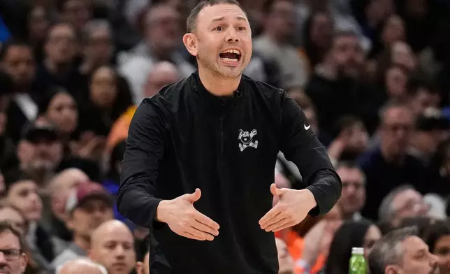 Denver Nuggets head coach David Adelman gestures in the second half of an NBA basketball against the Cleveland Cavaliers game Friday, Jan. 2, 2026, in Cleveland. (AP Photo/Sue Ogrocki)