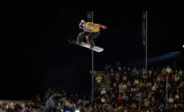 Scotty James of Australia in action during the final run of the Snowboard Halfpipe World Cup at Laax Open, in Laax, Switzerland, Saturday, Jan. 17, 2026. (Andreas Becker/Keystone via AP)