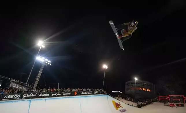 Scotty James of Australia in action during the final run of the Snowboard Halfpipe World Cup at Laax Open, in Laax, Switzerland, Saturday, Jan. 17, 2026. (Andreas Becker/Keystone via AP)