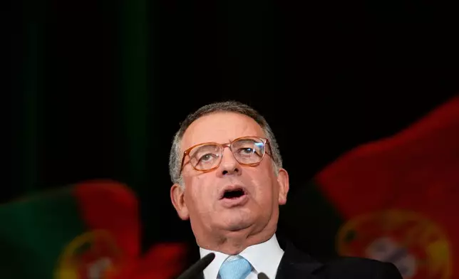 Presidential candidate Antonio Jose Seguro, of the center-left Socialist Party, delivers a speech at his campaign closing rally ahead of Sunday's presidential election, in Lisbon, Friday, Jan. 16, 2026. (AP Photo/Armando Franca)