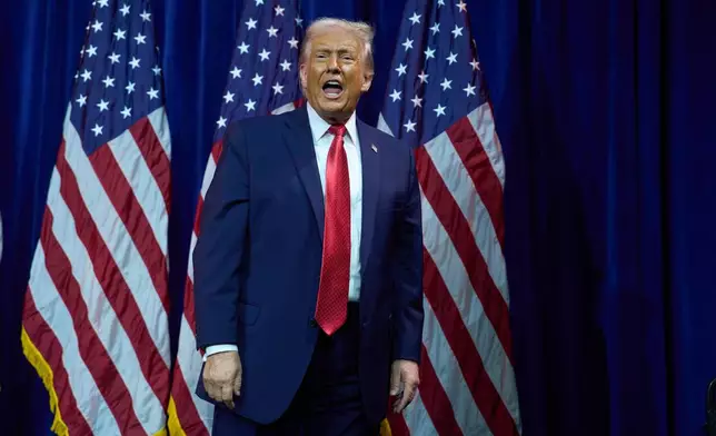President Donald Trump walks off stage after speaking to House Republican lawmakers during their annual policy retreat, Tuesday, Jan. 6, 2026, in Washington. (AP Photo/Evan Vucci)