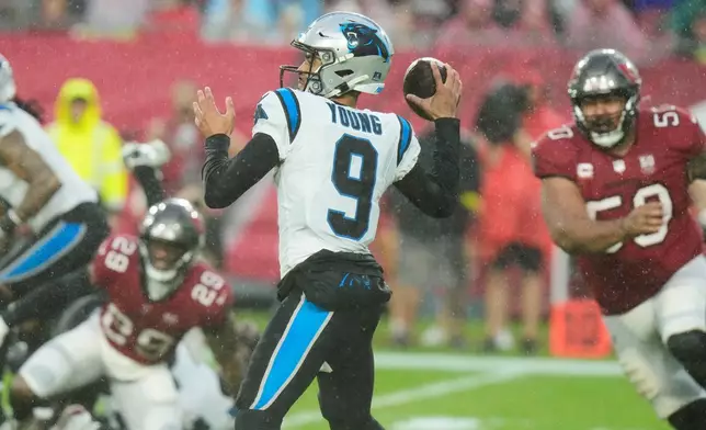 Carolina Panthers quarterback Bryce Young (9) throws a pass during the first half of an NFL football game against the Tampa Bay Buccaneers, Saturday, Jan. 3, 2026, in Tampa, Fla. (AP Photo/Chris O'Meara)