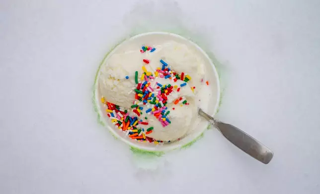 A dish of snow cream, made by mixing sweetened condensed milk with fresh snow, is seen Tuesday, Jan. 27, 2026, in Bow, N.H. (AP Photo/Holly Ramer)