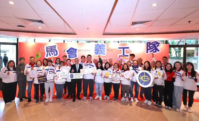 Jackson Woo, Steward of The Hong Kong Jockey Club (first row, 8th left), and Freely Cheng, the Club’s Head of External Affairs (first row, 9th left), with members of the Club’s CARE@hkjc Volunteer Team.