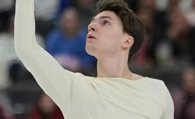 Maxim Naumov competes during the men's short program at the U.S. Figure Skating Championships, Thursday, Jan. 8, 2026, in St. Louis. (AP Photo/Stephanie Scarbrough)