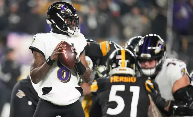 Baltimore Ravens quarterback Lamar Jackson (8) looks to throw during the first half of an NFL football game against the Pittsburgh Steelers, Sunday, Jan. 4, 2026, in Pittsburgh. (AP Photo/Gene J. Puskar)